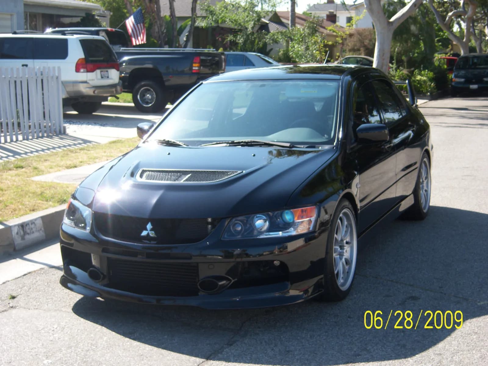 2006 Mitsubishi Lancer Evolution garage profile 2006 Mitsubishi Lancer Evolution owned by greekven1 — similar build on CarCultureHQ