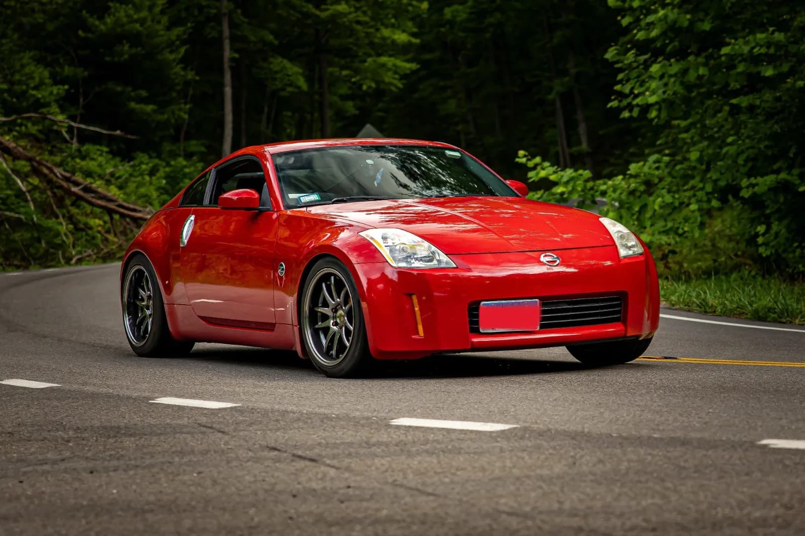 2004 Nissan 350Z garage profile 2004 Nissan 350Z owned by zro_cash — similar build on CarCultureHQ