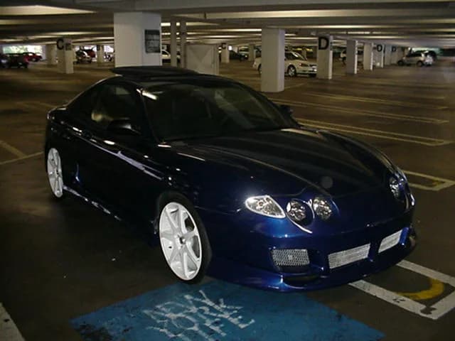 2000 Hyundai Tiburon garage profile 2000 Hyundai Tiburon owned by natedubb — similar build on CarCultureHQ