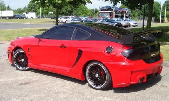 2003 Hyundai Tiburon garage profile 2003 Hyundai Tiburon owned by Ready2Play — similar build on CarCultureHQ